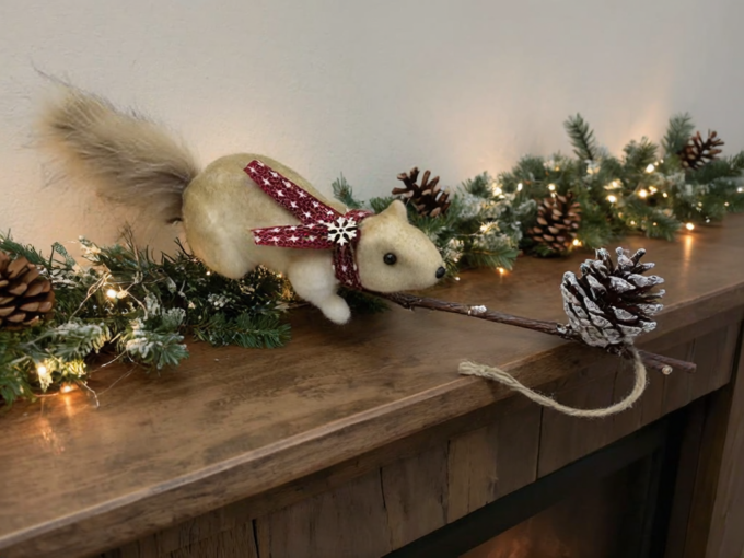 A-409 long-tail woodland squirrel Christmas decoration in a festive setting